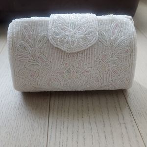 Beaded clutch, white with light pink floral design.